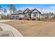 Scenic view of a home with a well-kept lawn and professional landscaping, showcasing its curb appeal at 114 Montgomery Ln, Villa Rica, GA 30180