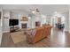 Open-concept living room features a fireplace, wood floors, and ample seating at 114 Montgomery Ln, Villa Rica, GA 30180