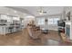 Spacious open-concept area, showcasing the living room and modern kitchen with stone countertops and stainless appliances at 114 Montgomery Ln, Villa Rica, GA 30180