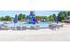 Community water park features a large pool, waterslides, play structures, and lounge areas at 114 Montgomery Ln, Villa Rica, GA 30180