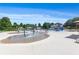 Community water park features a splash pad with sprinklers and a nearby water slide at 114 Montgomery Ln, Villa Rica, GA 30180