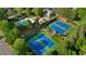 The community features tennis courts, a swimming pool, and a quaint clubhouse surrounded by mature trees at 362 Battle Woods Nw Trl, Marietta, GA 30064