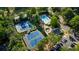An aerial view of community amenities, including a swimming pool, tennis courts and parking at 362 Battle Woods Nw Trl, Marietta, GA 30064