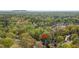 Aerial view of a home surrounded by lush trees with a red pin marking the spot at 362 Battle Woods Nw Trl, Marietta, GA 30064