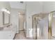 Neutral bathroom featuring a glass enclosed shower and vanity with drawers for storage at 362 Battle Woods Nw Trl, Marietta, GA 30064