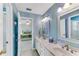 Colorful bathroom with a double sink vanity and a view into the bedroom at 362 Battle Woods Nw Trl, Marietta, GA 30064