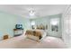 Bedroom with light-green walls, a ceiling fan, and two windows at 362 Battle Woods Nw Trl, Marietta, GA 30064