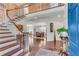 Elegant foyer with hardwood floors, staircase, and a view into the formal dining room, showcasing classic design at 362 Battle Woods Nw Trl, Marietta, GA 30064