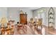 Formal living room features hardwood floors, elegant furnishings, and plenty of natural light from the French doors at 362 Battle Woods Nw Trl, Marietta, GA 30064