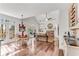 Open floor plan with hardwood floors, fireplace and large windows to the deck in the living and dining area at 362 Battle Woods Nw Trl, Marietta, GA 30064