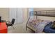 Bedroom with bunkbeds, a workstation, and ample natural light, perfect for  at 3642 Sunbridge Dr, Snellville, GA 30039