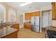 Spacious kitchen features granite counters, stainless steel appliances, breakfast nook, tile flooring, and plenty of counter space at 3642 Sunbridge Dr, Snellville, GA 30039