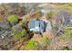 Birds eye view features this home with a deck surrounded by mature trees at 507 Anthony Pl, Canton, GA 30114