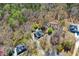 An aerial view shows the home nestled among the trees and landscaping at 507 Anthony Pl, Canton, GA 30114