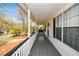 View of the long covered front porch, providing shade and a relaxing outdoor space at 507 Anthony Pl, Canton, GA 30114