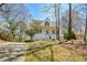 Charming home with a covered front porch, landscaped yard, and a paved driveway for easy access at 507 Anthony Pl, Canton, GA 30114