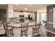 Stylish kitchen with stainless appliances, granite countertops, and a breakfast bar at 507 Anthony Pl, Canton, GA 30114