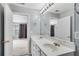 Bathroom featuring double sink vanity with a large mirror and neutral wall color at 111 Riverstone Commons Cir, Canton, GA 30114