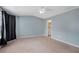 View of bedroom space with a ceiling fan and ensuite bath at 111 Riverstone Commons Cir, Canton, GA 30114