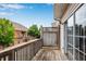 Outdoor deck with wooden railing and sliding glass doors offering views of the yard at 111 Riverstone Commons Cir, Canton, GA 30114