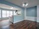 Open-concept living space with a view of the kitchen and dining area at 111 Riverstone Commons Cir, Canton, GA 30114