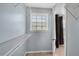 Spacious walk-in closet with shelving at 111 Riverstone Commons Cir, Canton, GA 30114