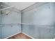 Walk-in closet with shelving and storage space at 111 Riverstone Commons Cir, Canton, GA 30114