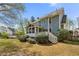 Backyard with a screened in porch and stair case at 1460 Edgemont Pt, Lawrenceville, GA 30044