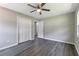 Well-lit bedroom features hardwood floors and a spacious closet at 732 Quaker Sw St, Atlanta, GA 30315