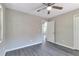 Bedroom with gray walls and gray wood floors at 732 Quaker Sw St, Atlanta, GA 30315