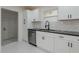 Newly renovated kitchen featuring white cabinets, stainless appliances, and subway tile backsplash at 1956 Washington Rd, East Point, GA 30344