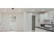 Newly renovated kitchen featuring white cabinets and modern light fixtures at 1956 Washington Rd, East Point, GA 30344