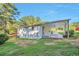 Side view of house, backyard and driveway at 3650 Clovis Nw Ct, Atlanta, GA 30331