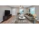 Inviting living room with neutral tones, stylish furniture, and ample natural light at 3650 Clovis Nw Ct, Atlanta, GA 30331