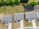 Aerial view showcasing a neighborhood featuring new homes at 3681 Deaton Trl, Buford, GA 30519
