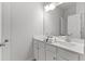 Bright bathroom featuring a double sink vanity with a large mirror and ample counter space at 3681 Deaton Trl, Buford, GA 30519