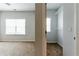 Bedroom with window to the left with closet on the right at 3681 Deaton Trl, Buford, GA 30519