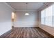 Bright dining room with traditional wainscoting and large windows at 3681 Deaton Trl, Buford, GA 30519