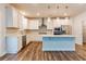 Well-appointed kitchen featuring stainless steel appliances and a functional center island at 3681 Deaton Trl, Buford, GA 30519