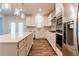 Modern kitchen with stainless steel appliances and a center island at 3681 Deaton Trl, Buford, GA 30519