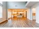 Open floor plan featuring a living area flowing into a modern kitchen at 3681 Deaton Trl, Buford, GA 30519
