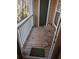 Cozy private balcony with wood flooring, and seating area at 434 Bentley Place, Tucker, GA 30084