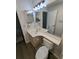 This bathroom includes an elongated vanity with double sinks and an updated faucet at 434 Bentley Place, Tucker, GA 30084