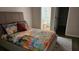 Bedroom with a comfortable bed, colorful quilt, and an en-suite bathroom at 434 Bentley Place, Tucker, GA 30084