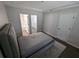 Neutral bedroom featuring access to an ensuite bathroom and a walk-in closet at 434 Bentley Place, Tucker, GA 30084