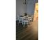 Cozy dining area with a round table, seating for four, and modern chandelier at 434 Bentley Place, Tucker, GA 30084