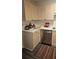 Efficient kitchen with stainless steel appliances and light wood cabinets at 434 Bentley Place, Tucker, GA 30084