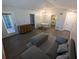 Cozy living room featuring hardwood floors, neutral paint, and access to the balcony at 434 Bentley Place, Tucker, GA 30084