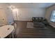 The living room has updated flooring and neutral colors at 434 Bentley Place, Tucker, GA 30084