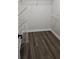 Walk-in closet with multiple shelves, ready for organizing your wardrobe at 434 Bentley Place, Tucker, GA 30084